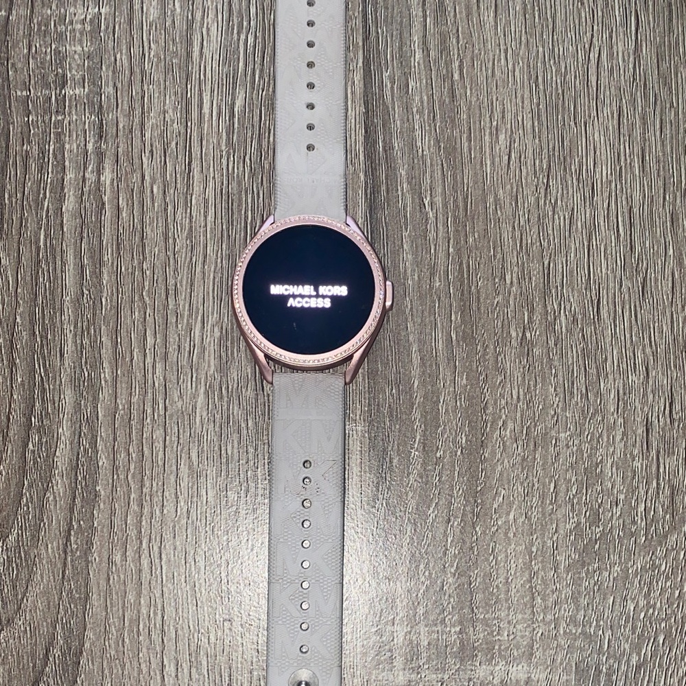 MK Access smartwatch, rose gold with grey band